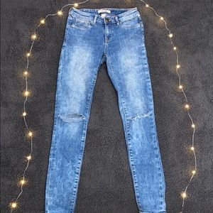 Light blue wash jeans, ripped